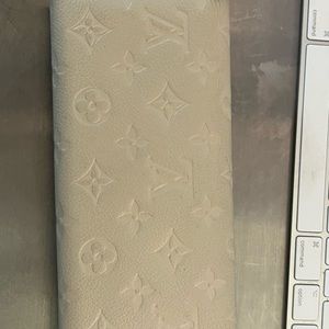 Louis Vuitton vintage Curieuse wallet in Monogram Empreinte Leather